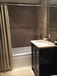 Clara Cleaning Services, LLC cleaning technician vacuuming carpet